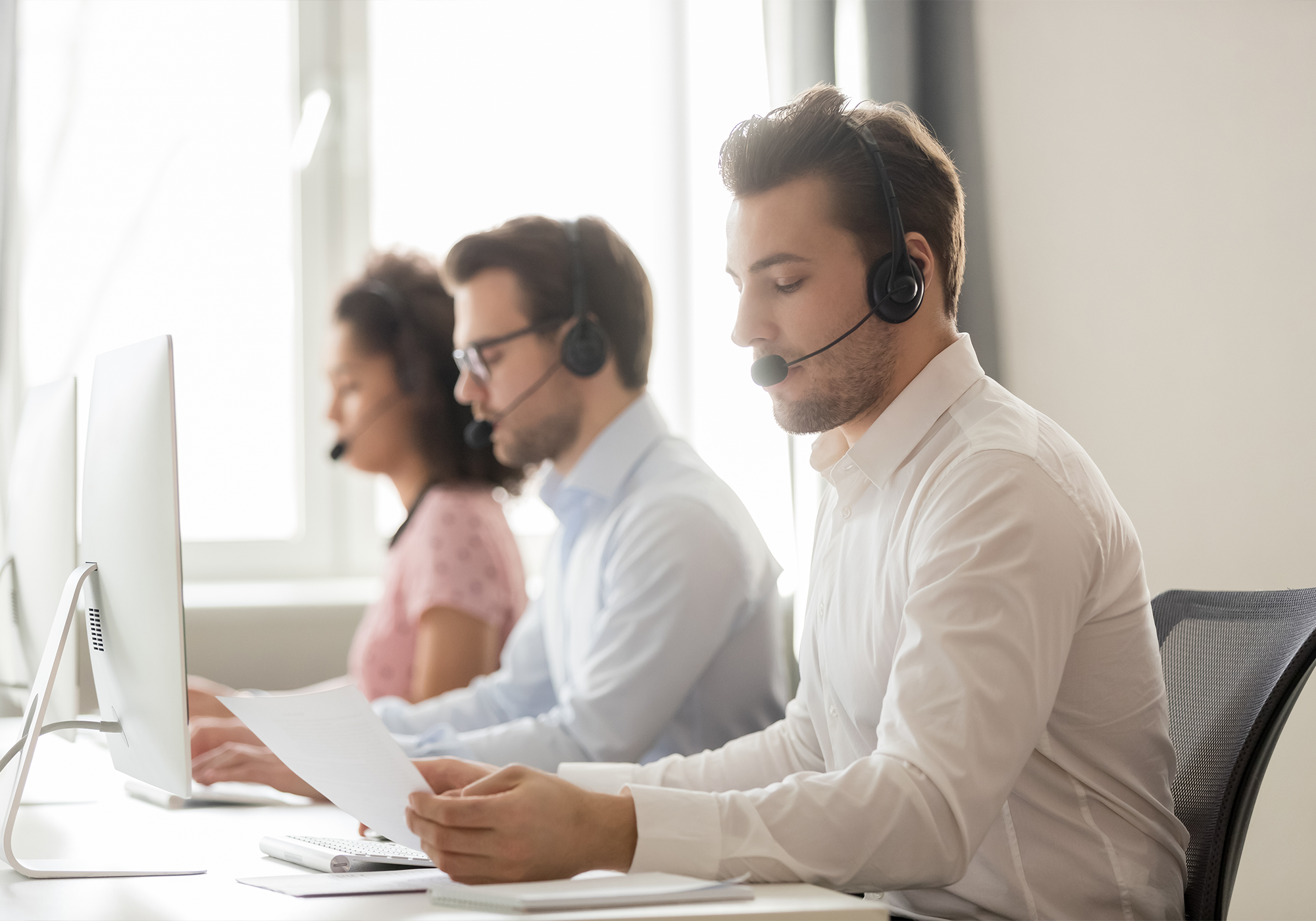 Help center employees with headsets