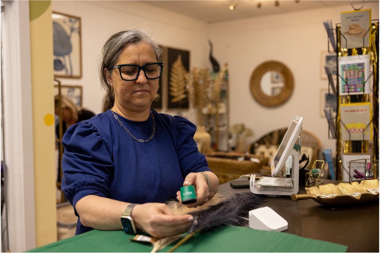 Employee scanning item at register